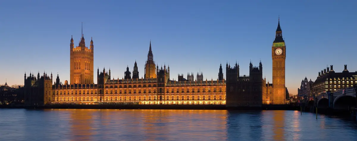 The Palace of Westminster on the Thames at dusk